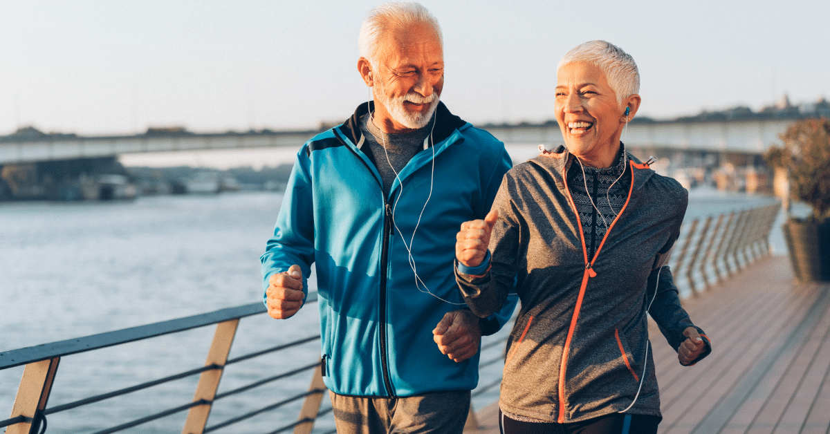 9 Retired couple walking along the boardwalk